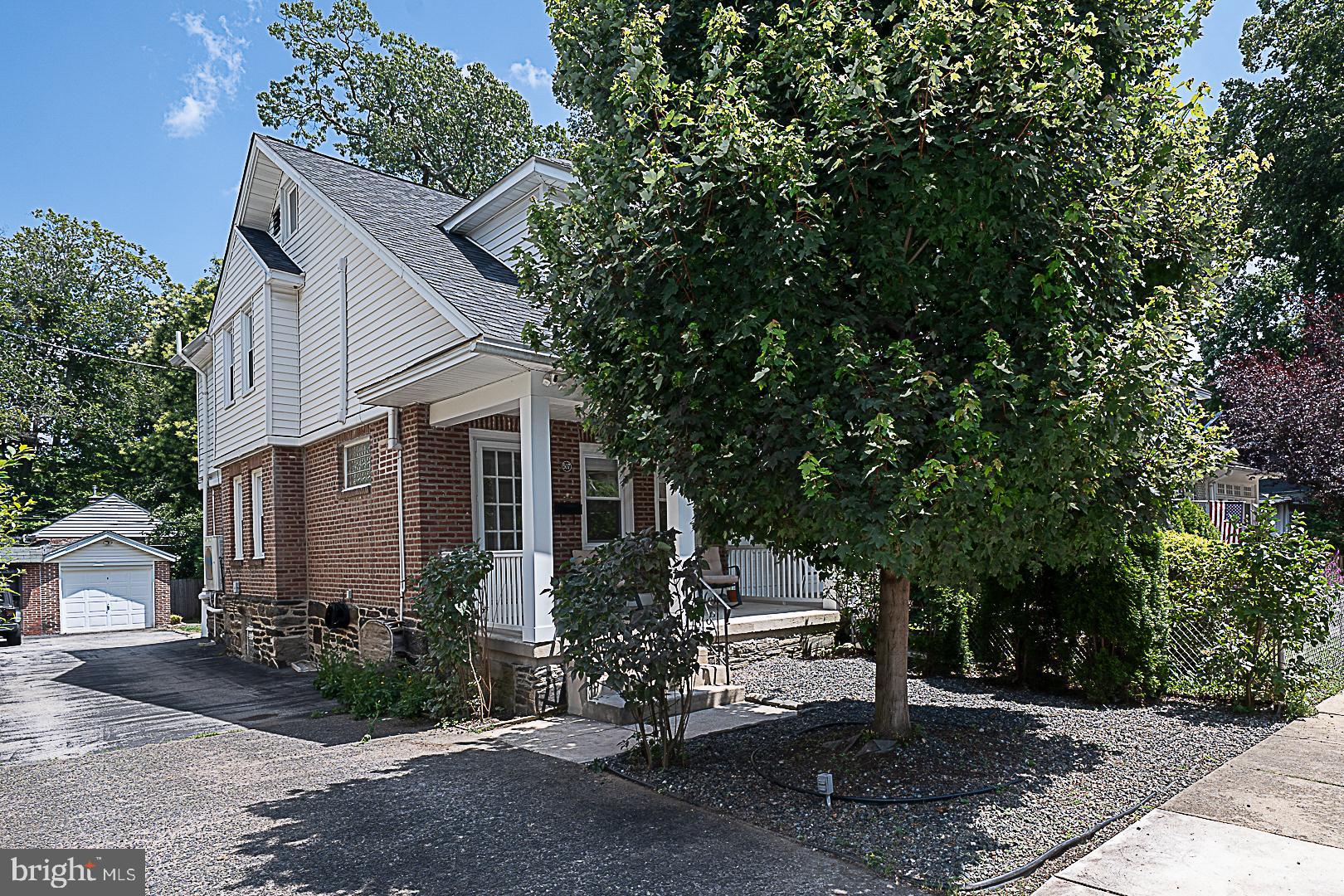 507 Homewood Avenue Narberth, PA 19072 - Photo 1 of 31 a white house with trees in front of it