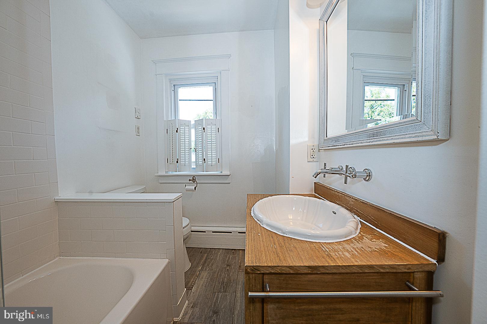 507 Homewood Avenue Narberth, PA 19072 - Photo 17 of 31 a bathroom with a sink a toilet and bathtub