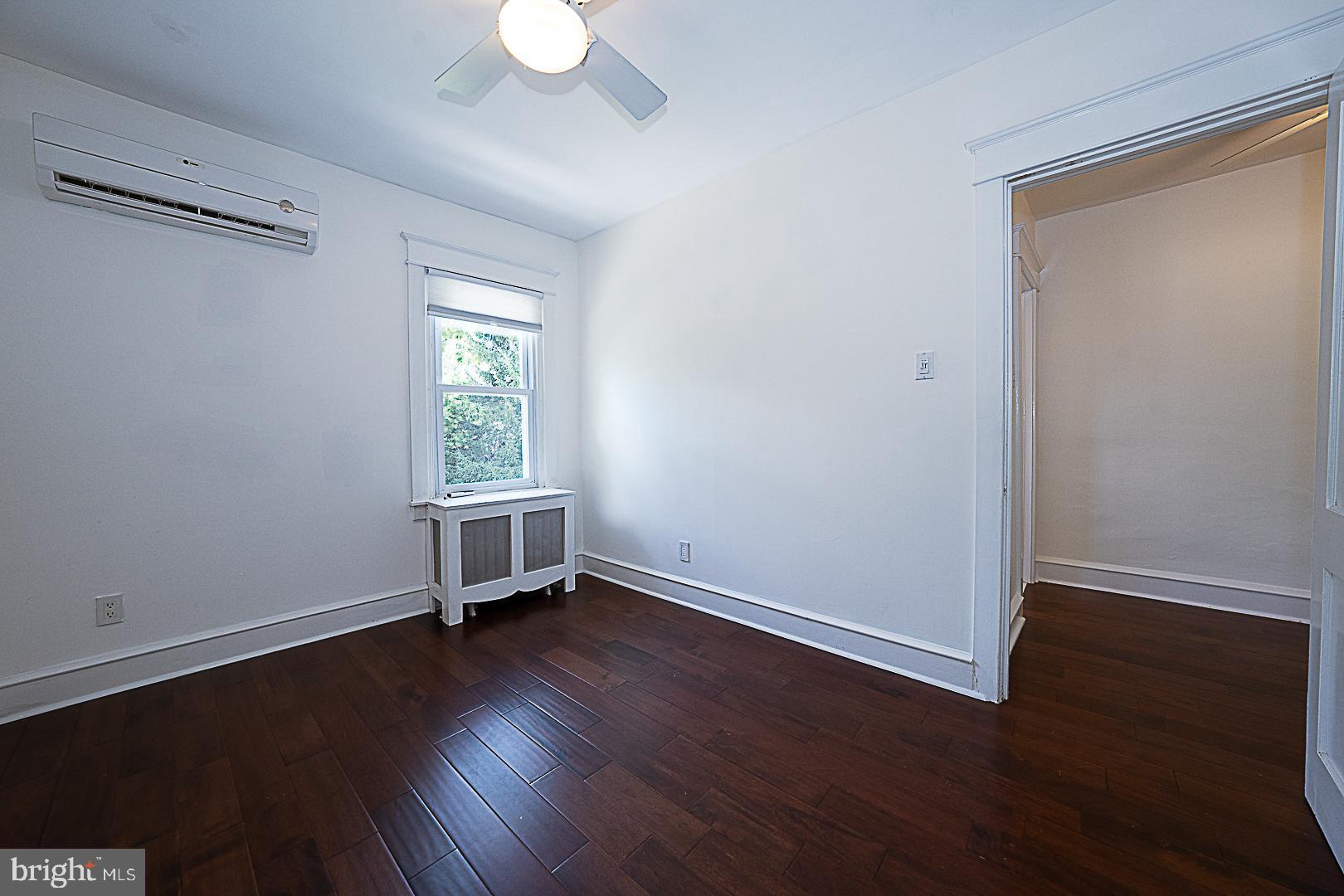 507 Homewood Avenue Narberth, PA 19072 - Photo 20 of 31 a view of empty room with wooden floor and fan