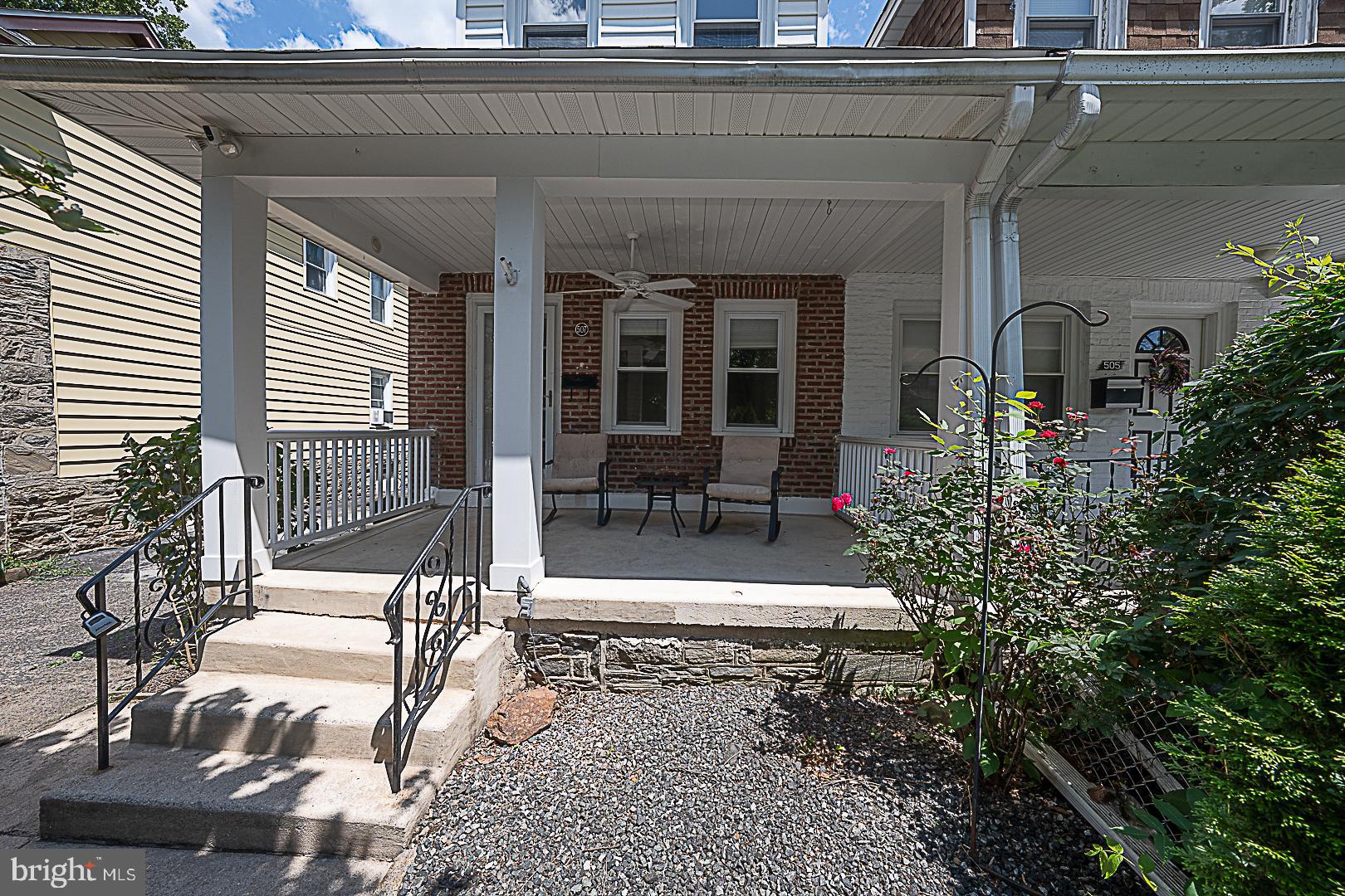 507 Homewood Avenue Narberth, PA 19072 - Photo 4 of 31 a balcony with table and chairs and potted plants