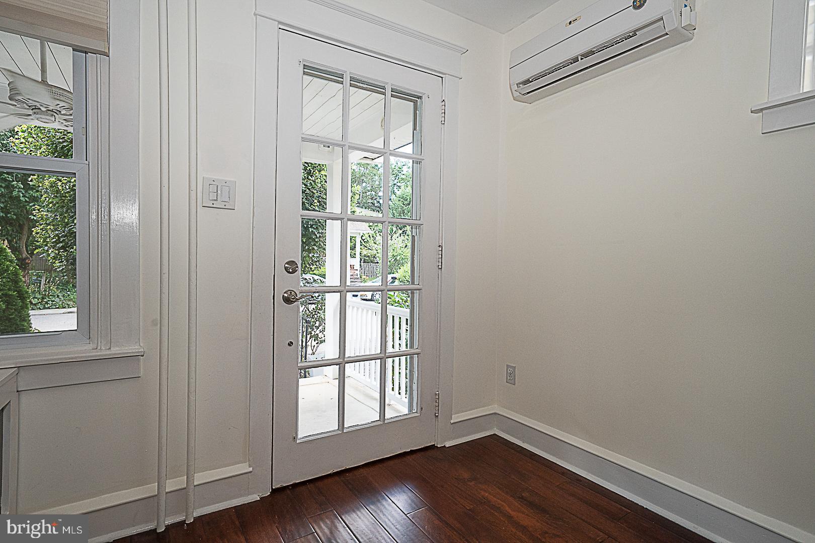 507 Homewood Avenue Narberth, PA 19072 - Photo 5 of 31 a view of an empty room with wooden floor and a window