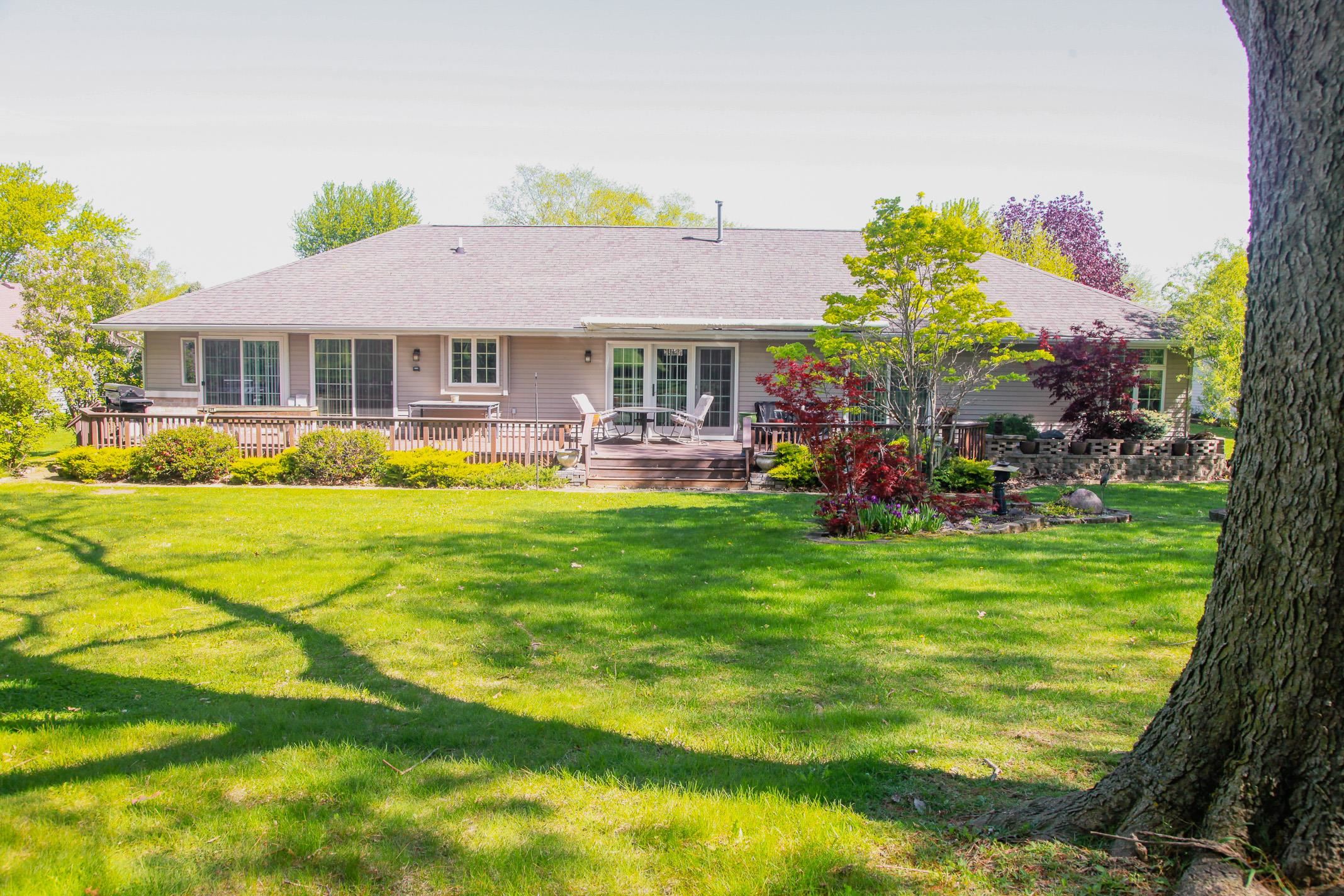 3001 Countryside Lane Freeport, IL 61032 - Photo 44 of 47 a front view of a house with a garden