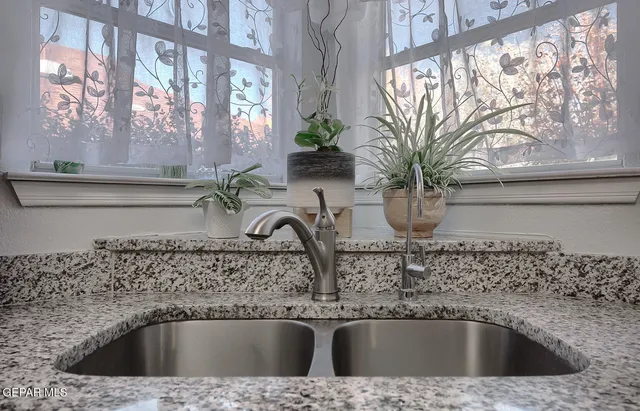 a close view of sink and a window