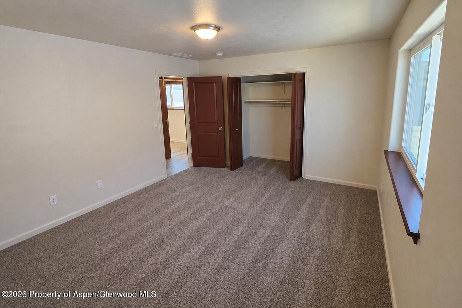 1648 Arabian Avenue Rifle, CO 81650 - Photo 3 of 15 a view of empty room with front door