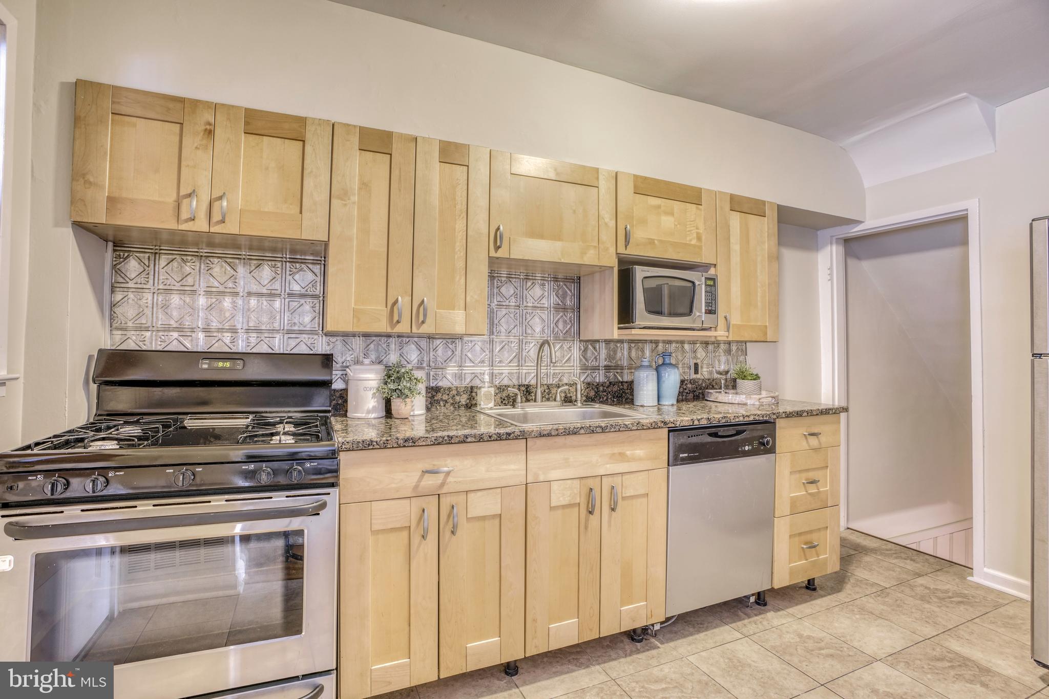 8071 Wallace Road Baltimore, MD 21222 - Photo 11 of 33 Updated Kitchen with Stainless Steel Appliances