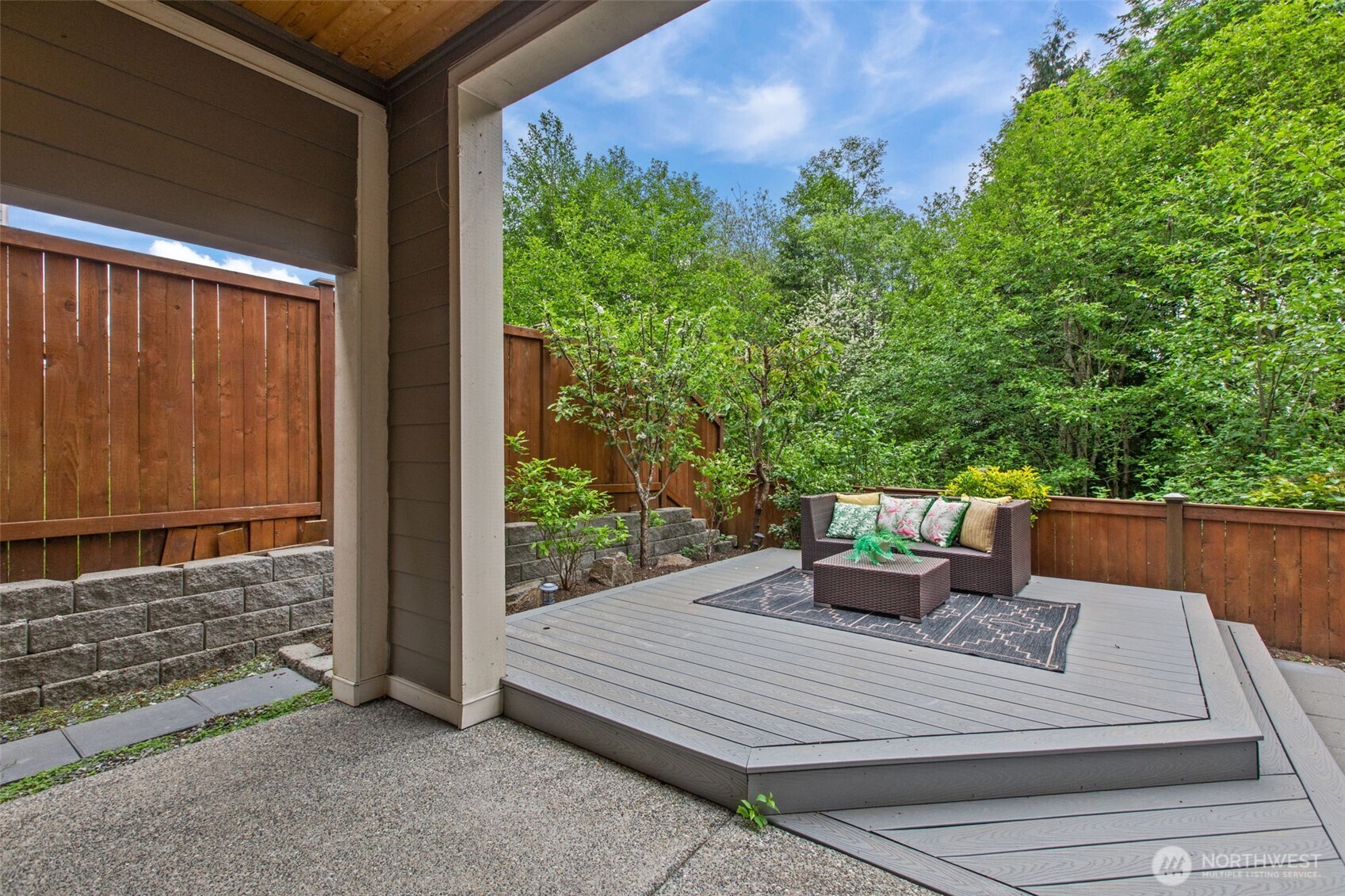 18231 3rd Drive Southeast Bothell, WA 98012 - Photo 37 of 40 a wooden bench sitting in front of a building