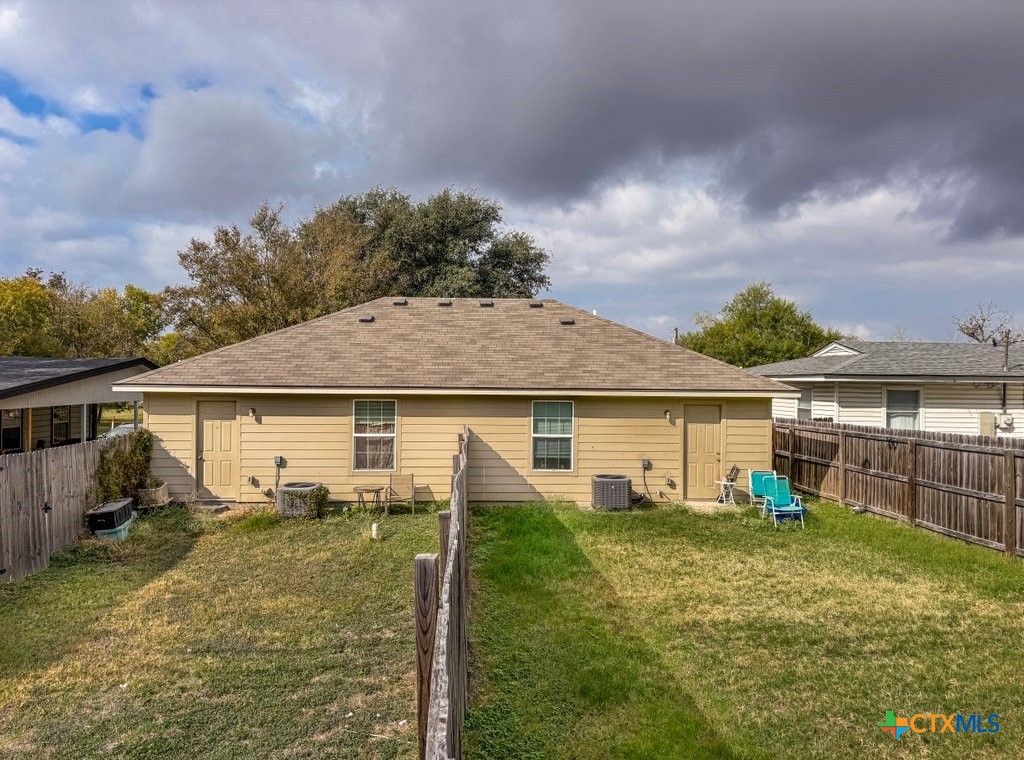 113 South 41st Street Temple, TX 76504 - Photo 5 of 18 a view of a house with backyard and sitting area