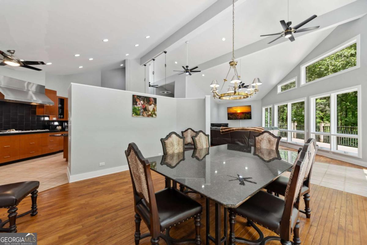 10323 Grassy Mountain Road Ellijay, GA 30540 - Photo 57 of 70 a view of a dining room with furniture