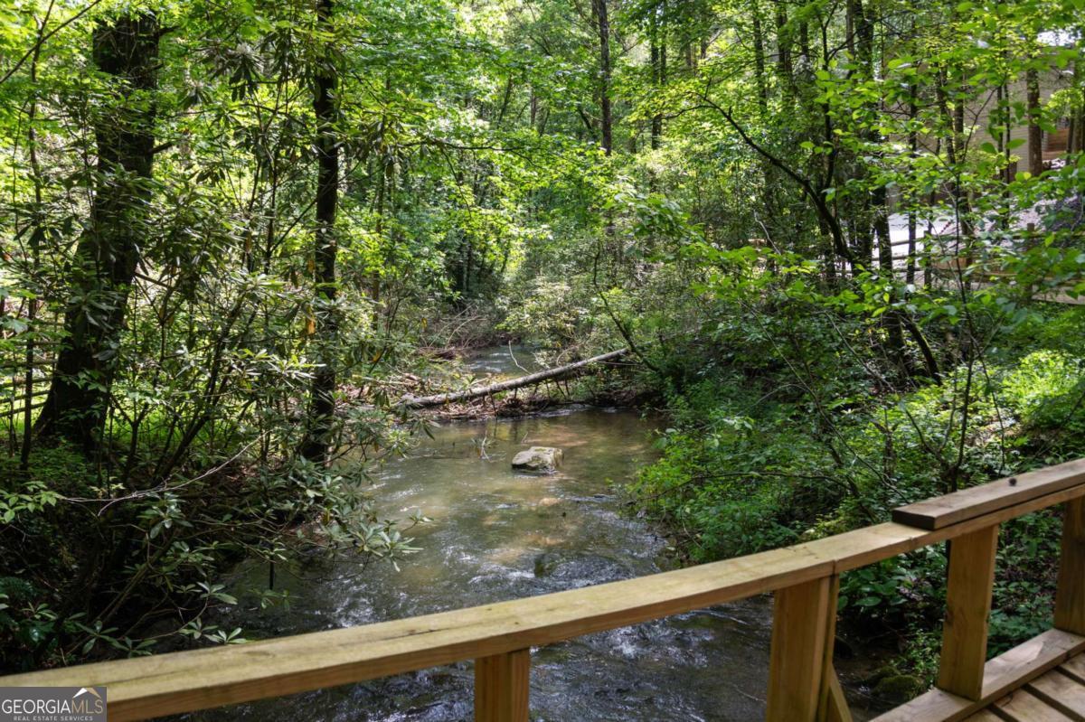 10323 Grassy Mountain Road Ellijay, GA 30540 - Photo 70 of 70 a view of a wooden bridge
