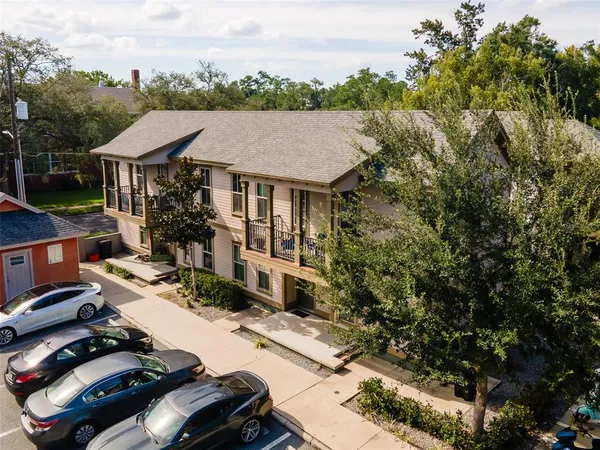 a aerial view of a house with swimming pool and patio