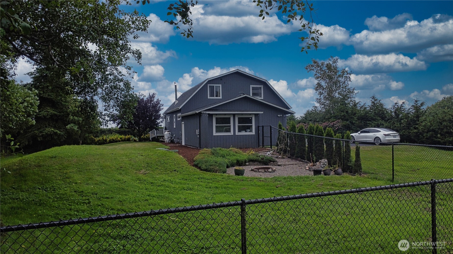 240 Stringtown Road Ilwaco, WA 98624 - Photo 37 of 39 a front view of a house with garden