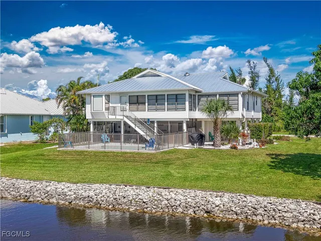 a view of a house with a garden