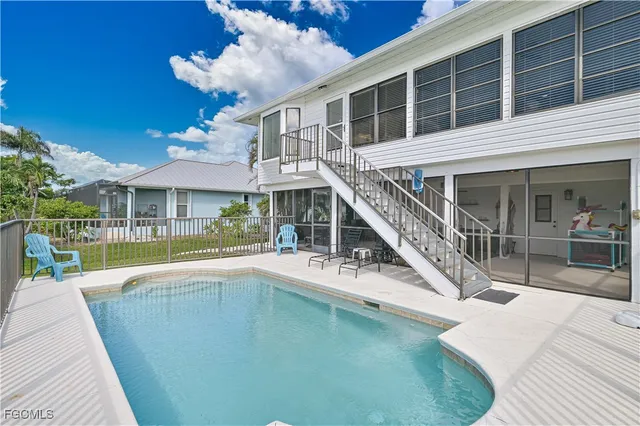 a view of a house with a swimming pool