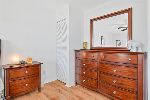 a room with a dresser and a mirror
