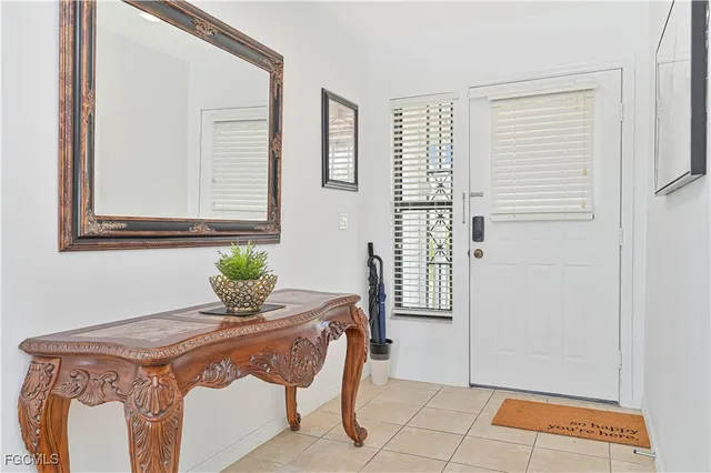 a bathroom with a granite countertop sink and a bathtub