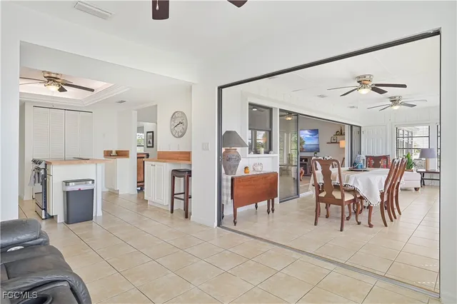 a view of a dining room with furniture window and outside view
