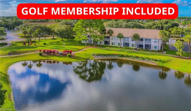 a sign that is sitting on a brick wall