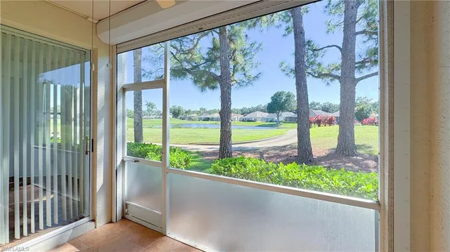 a view of a porch and a yard