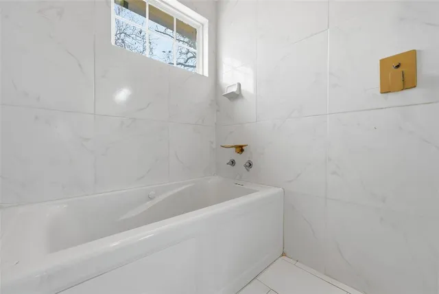 a bathroom with a bathtub