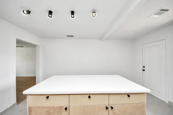 a room with a air conditioner and window