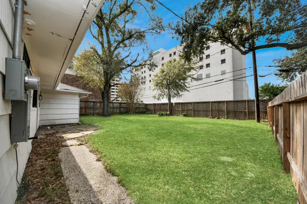 a view of a backyard with a garden