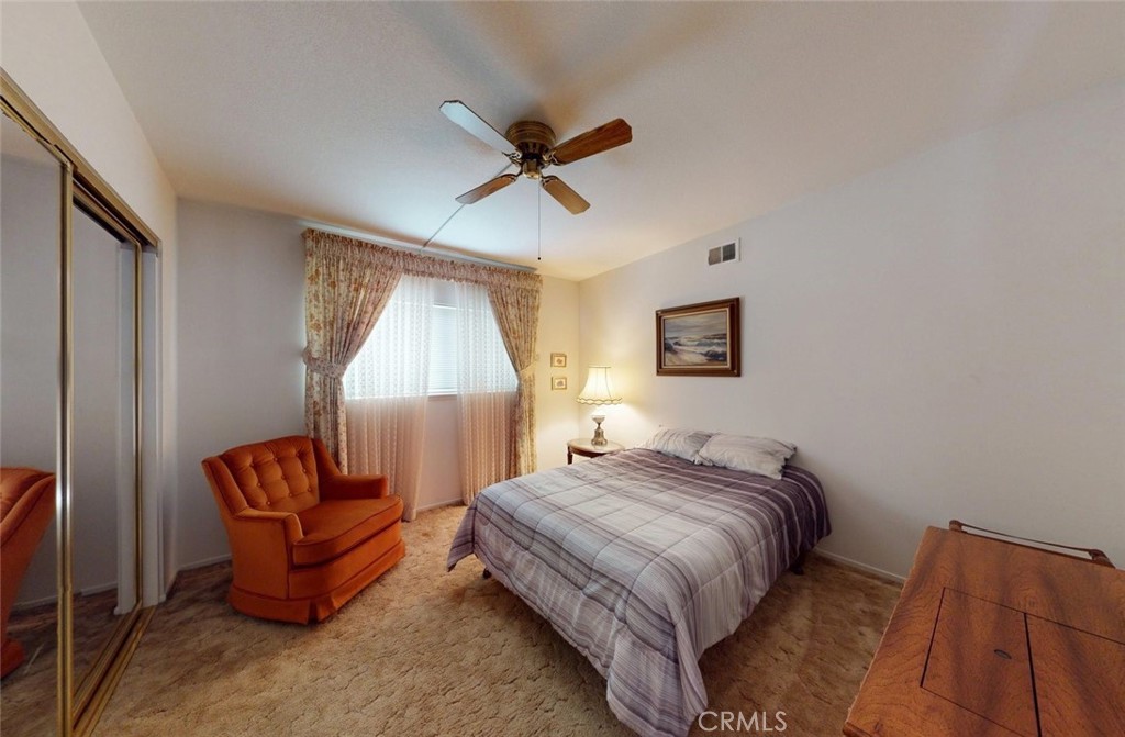 9901 Westhaven Circle Westminster, CA 92683 - Photo 20 of 41 a bedroom with a bed and a couch