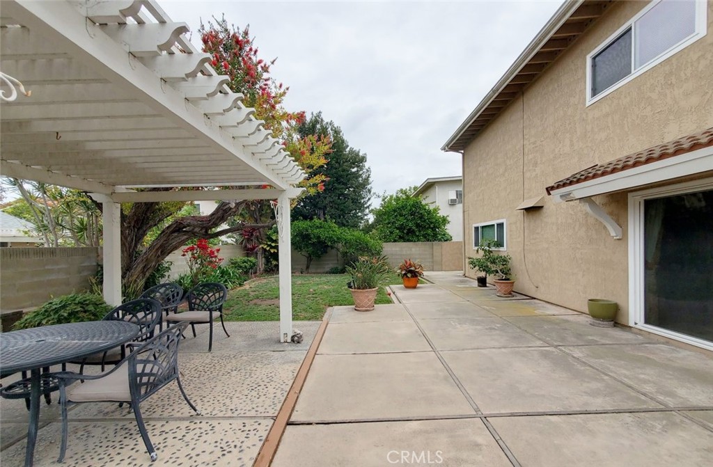 9901 Westhaven Circle Westminster, CA 92683 - Photo 36 of 41 a view of a patio with table and chairs and potted plants