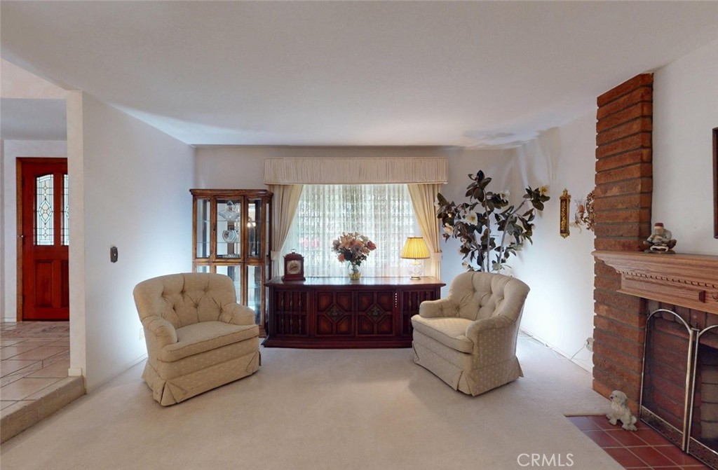 9901 Westhaven Circle Westminster, CA 92683 - Photo 7 of 41 a living room with furniture and a fireplace