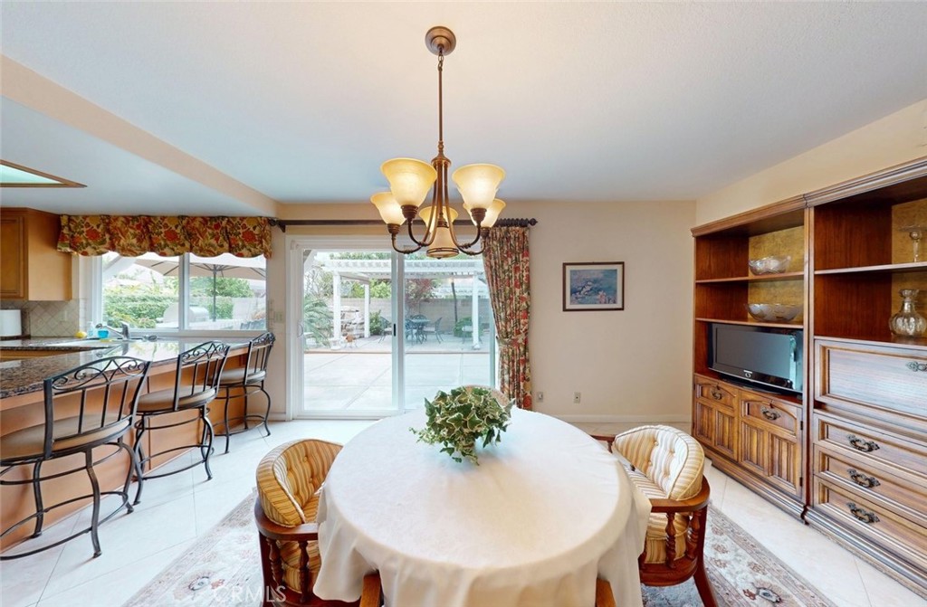 9901 Westhaven Circle Westminster, CA 92683 - Photo 8 of 41 a view of a dining room with furniture window and outside view