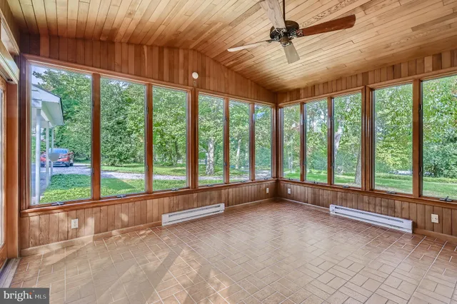 a view of room with a large window