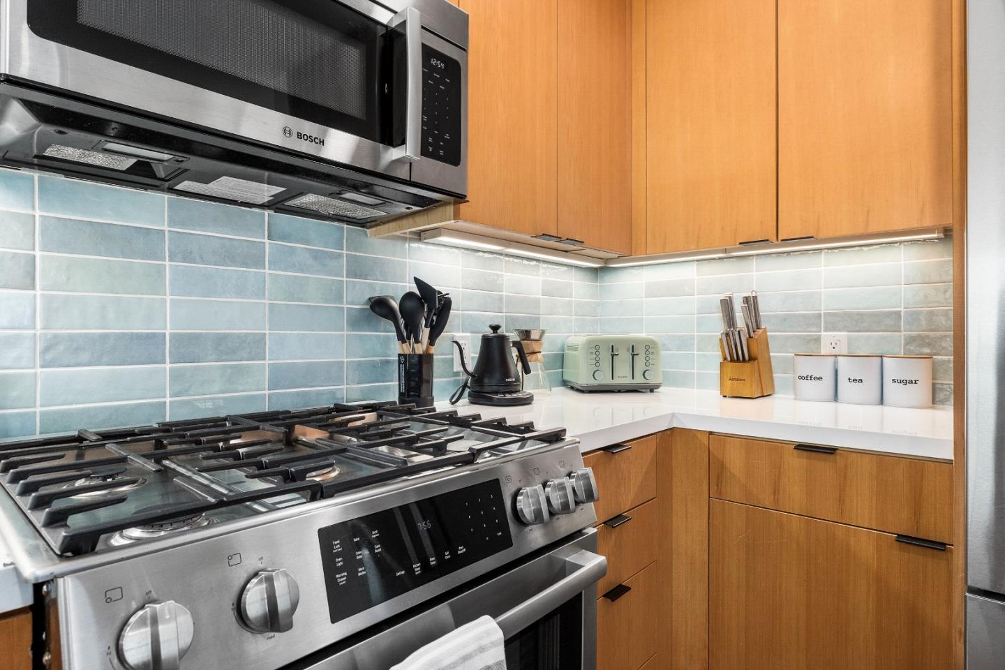 208 Capitola Avenue Capitola, CA 95010 - Photo 31 of 46 a stove top oven sitting inside of a kitchen