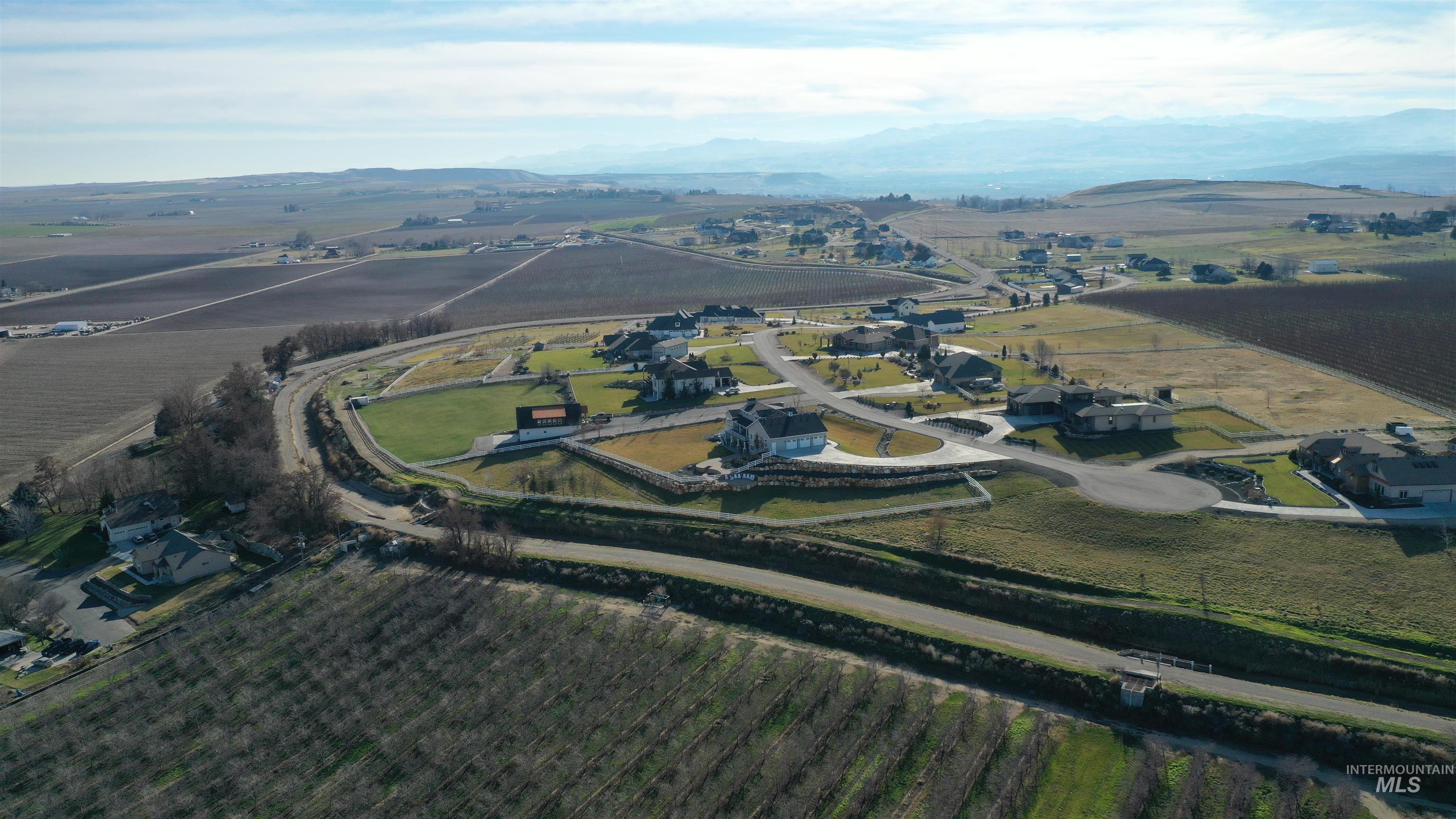 Tbd Riverside Road Caldwell, ID 83607 - Photo 11 of 35 Aerial overview of property's location featuring abundant farmland, rural landscape, and a mountainous background
