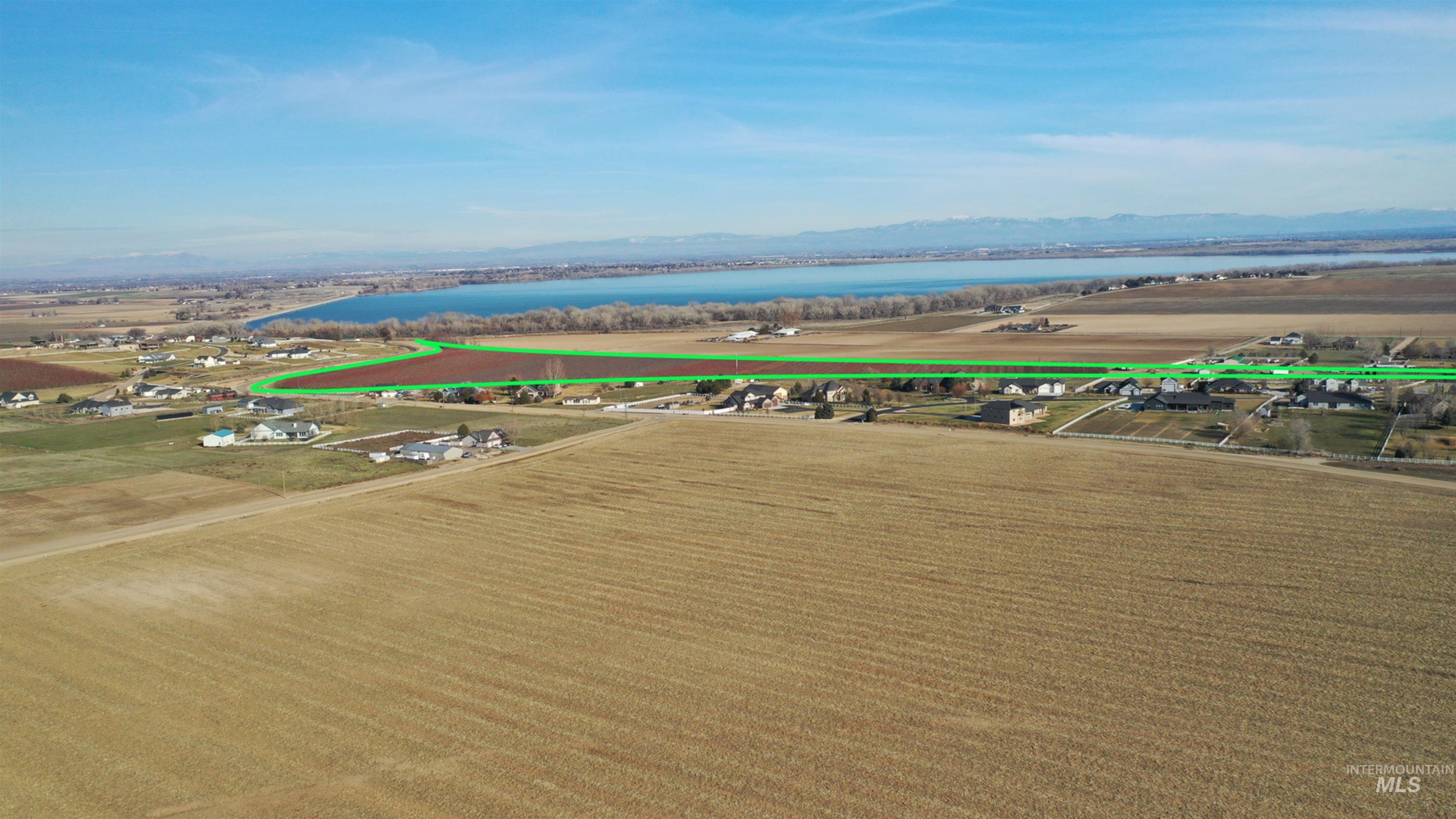 Tbd Riverside Road Caldwell, ID 83607 - Photo 22 of 35 Aerial view of sparsely populated area featuring a water and mountain view and extensive farmland