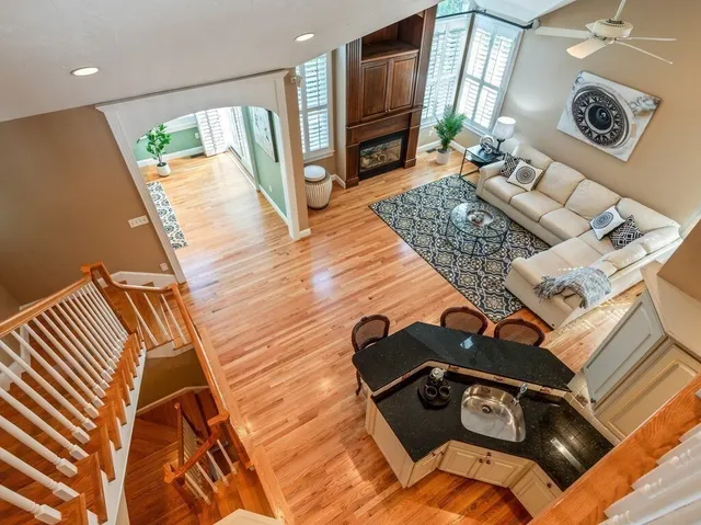 a view of living room with furniture and a flat screen tv