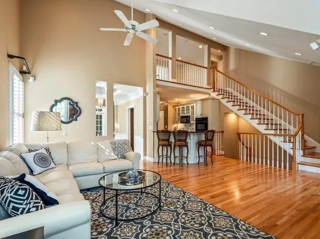 a living room with furniture and a table