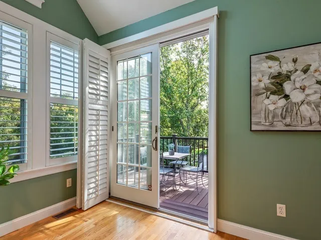 a view of a room with a large window