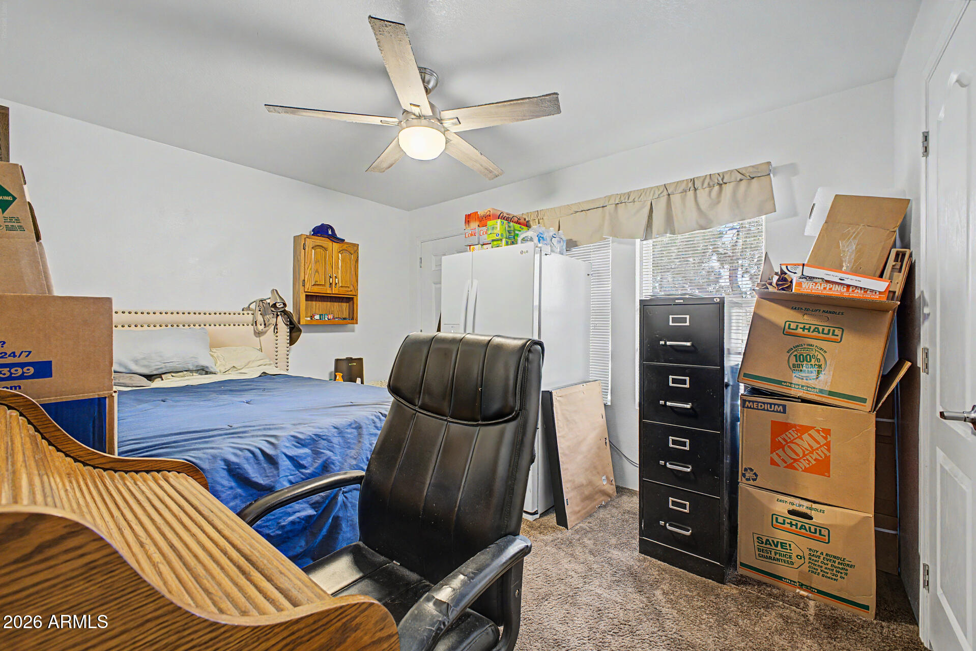 625 West McKellips Road, Unit 55 Mesa, AZ 85201 - Photo 11 of 21 a bedroom with a bed and furniture
