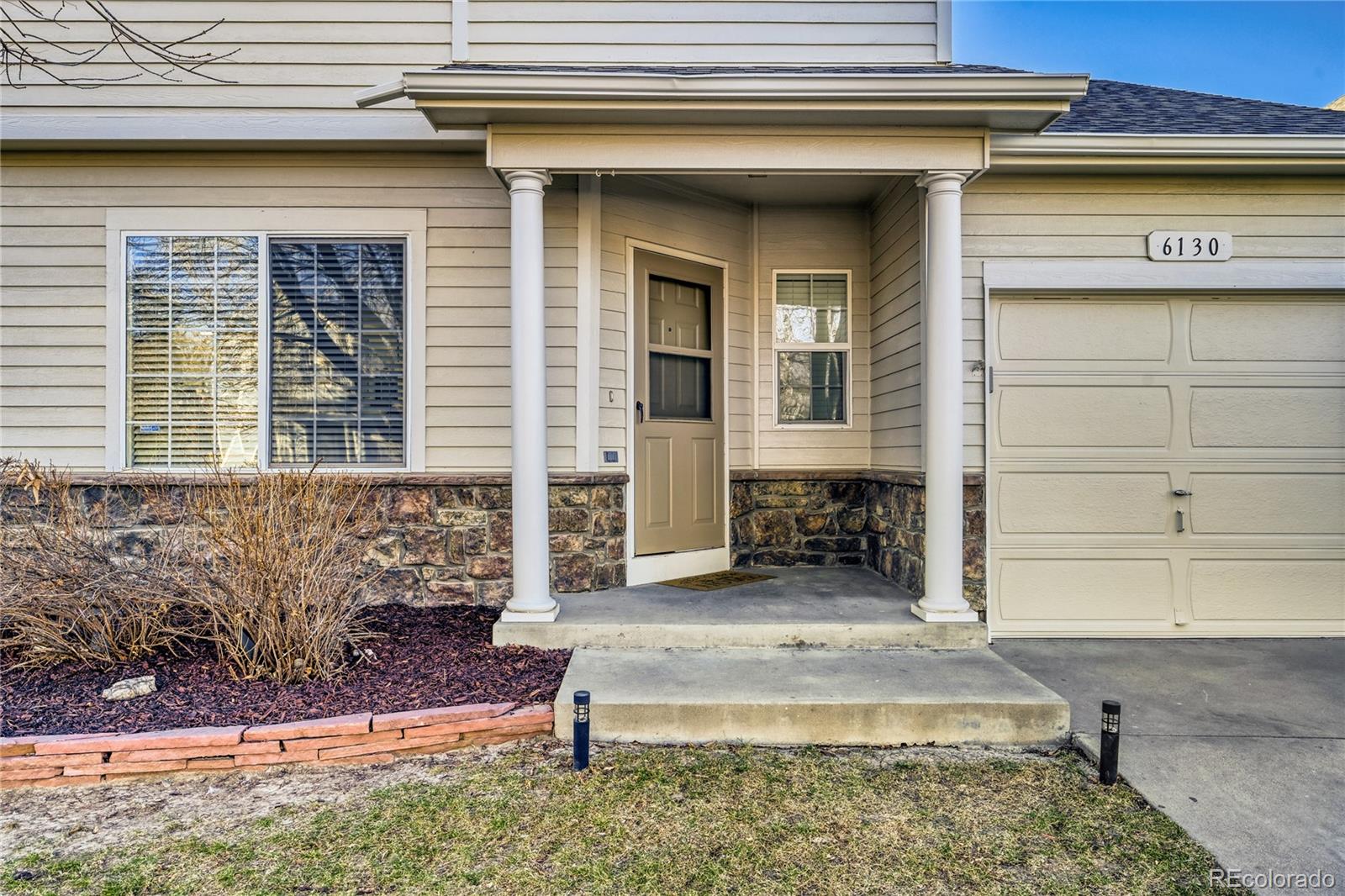 6130 Gorham Street Frederick, CO 80530 - Photo 3 of 47 a front view of a house