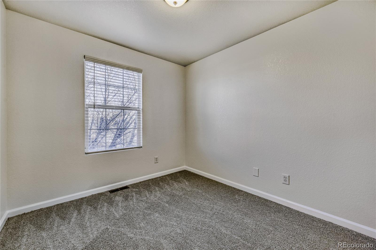 6130 Gorham Street Frederick, CO 80530 - Photo 31 of 47 an empty room with a window