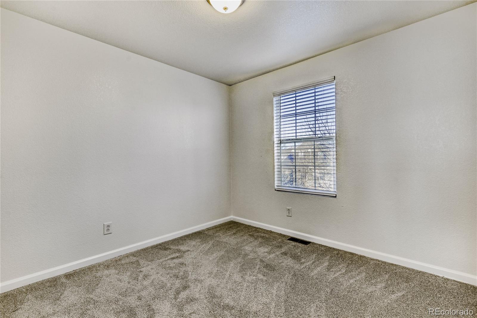 6130 Gorham Street Frederick, CO 80530 - Photo 35 of 47 an empty room with a window