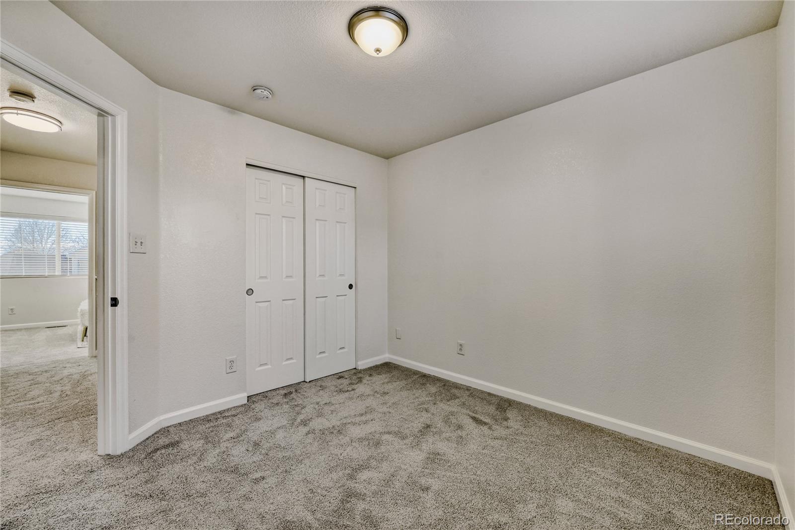 6130 Gorham Street Frederick, CO 80530 - Photo 36 of 47 an empty room with closet area