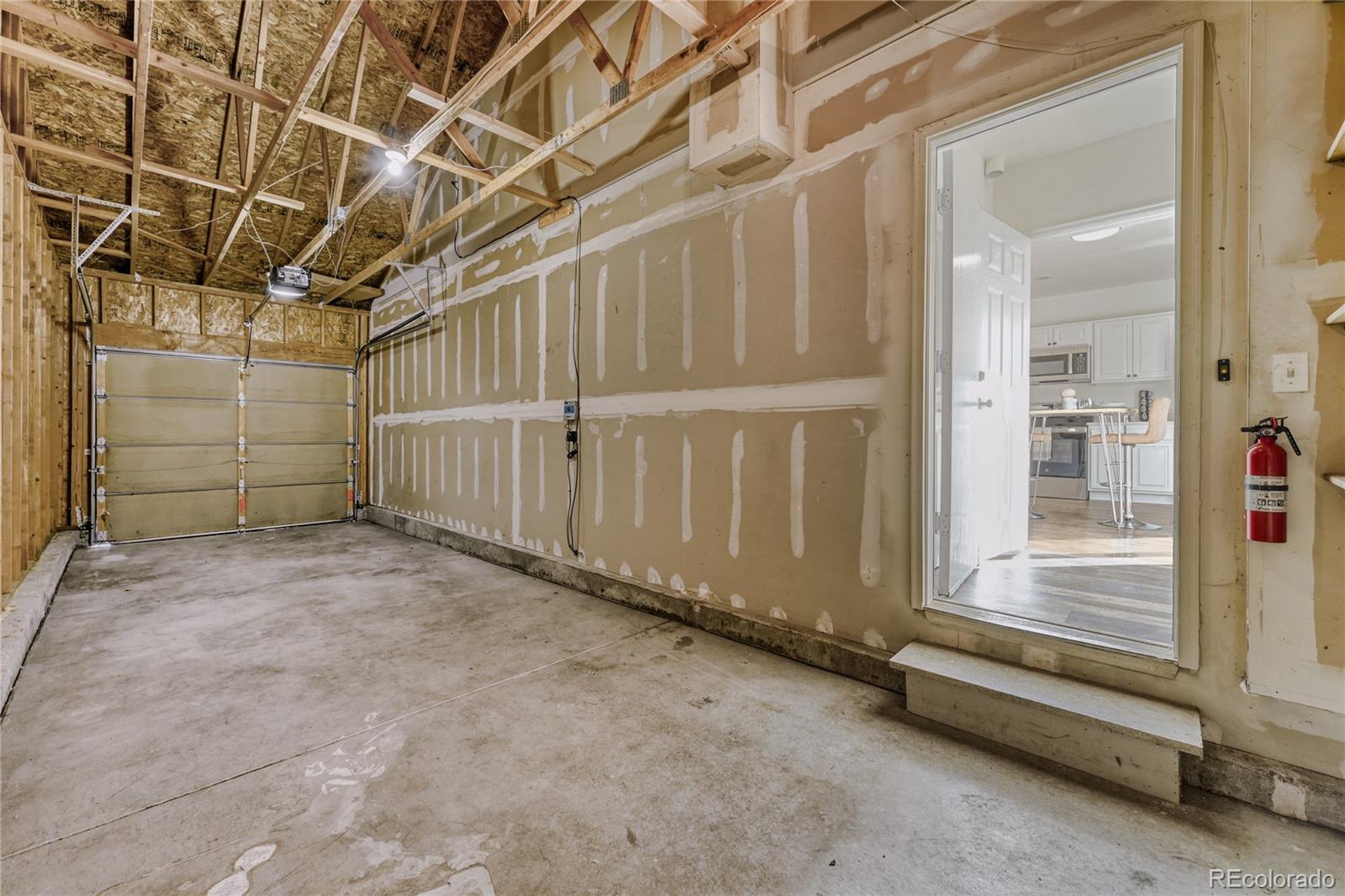 6130 Gorham Street Frederick, CO 80530 - Photo 40 of 47 a view of a room with wooden walls
