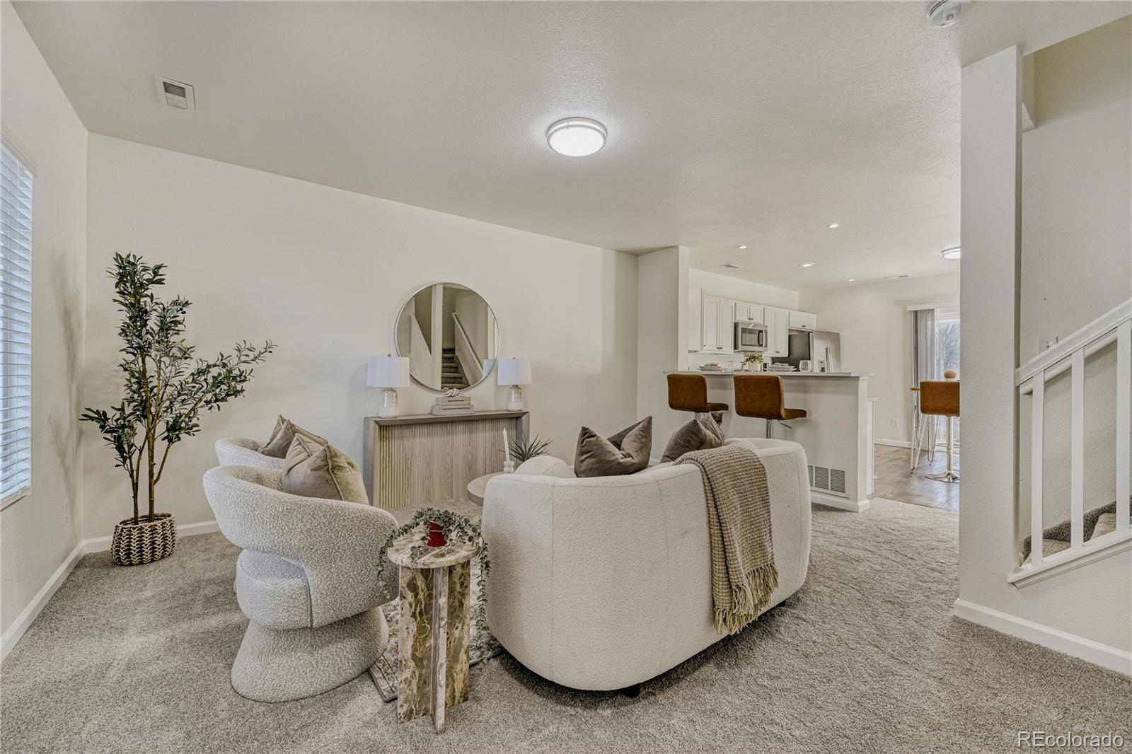 6130 Gorham Street Frederick, CO 80530 - Photo 4 of 47 a living room with furniture and a table