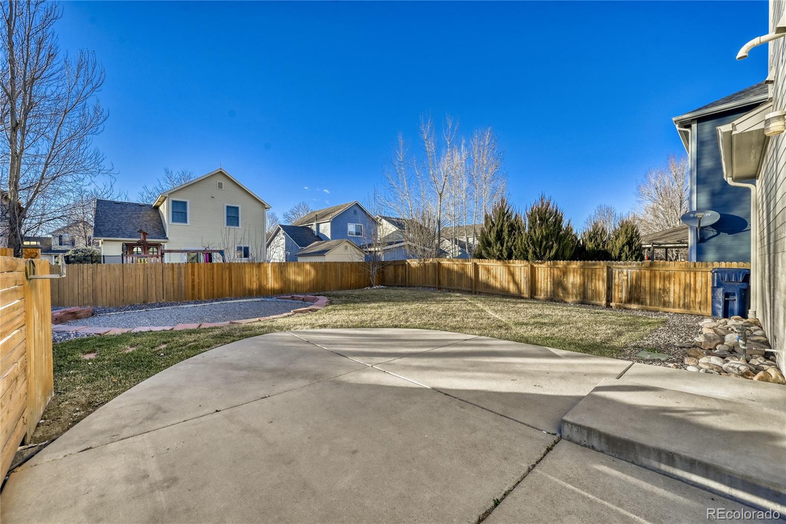6130 Gorham Street Frederick, CO 80530 - Photo 41 of 47 a view of house with a yard and a large tree