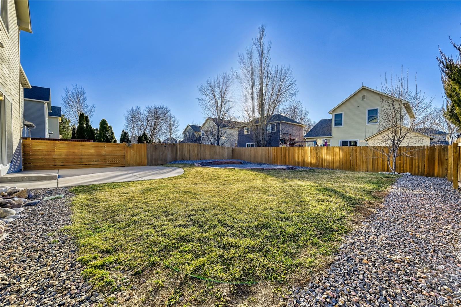 6130 Gorham Street Frederick, CO 80530 - Photo 42 of 47 a view of a yard with a house