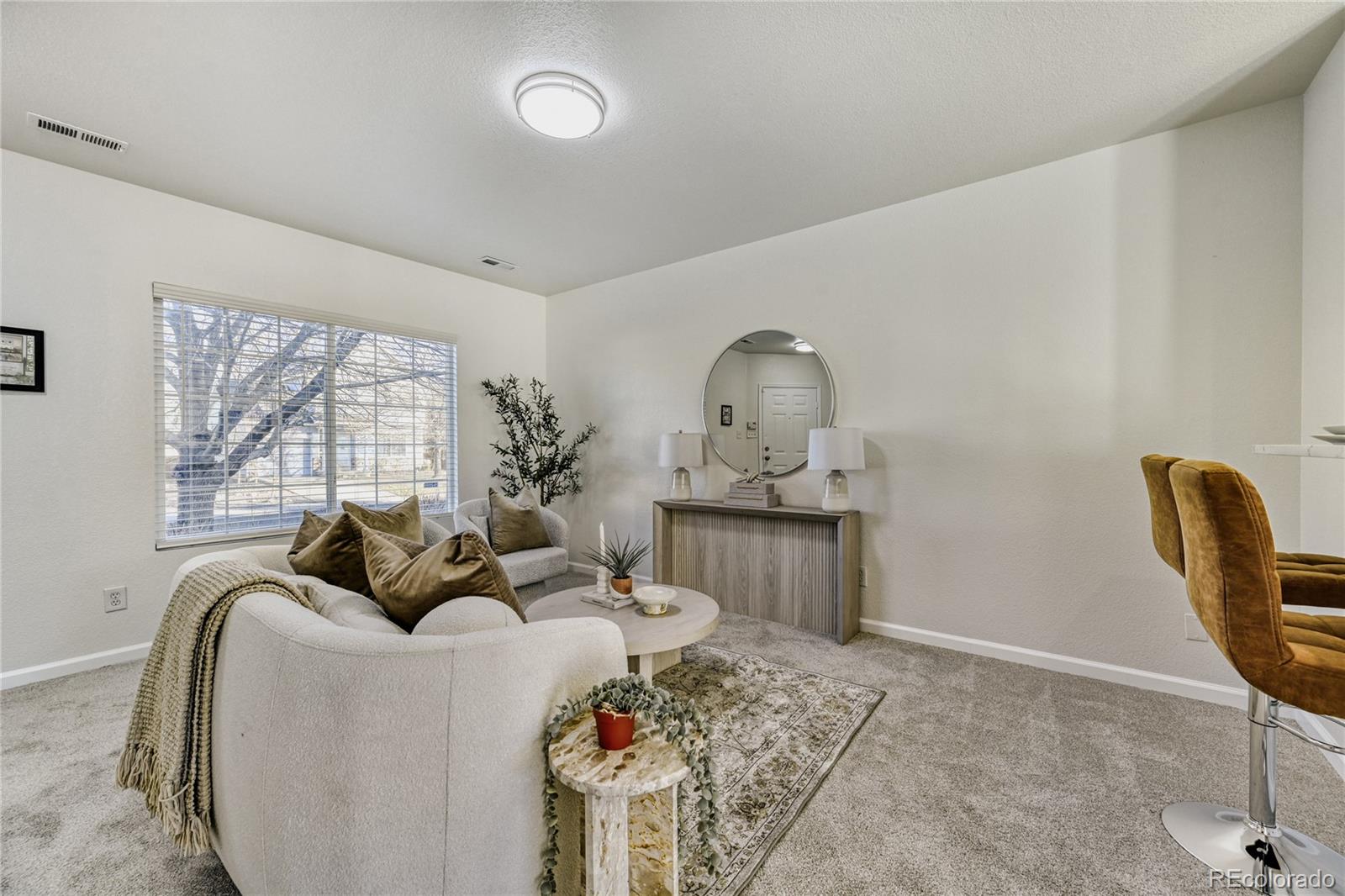 6130 Gorham Street Frederick, CO 80530 - Photo 6 of 47 a living room with furniture