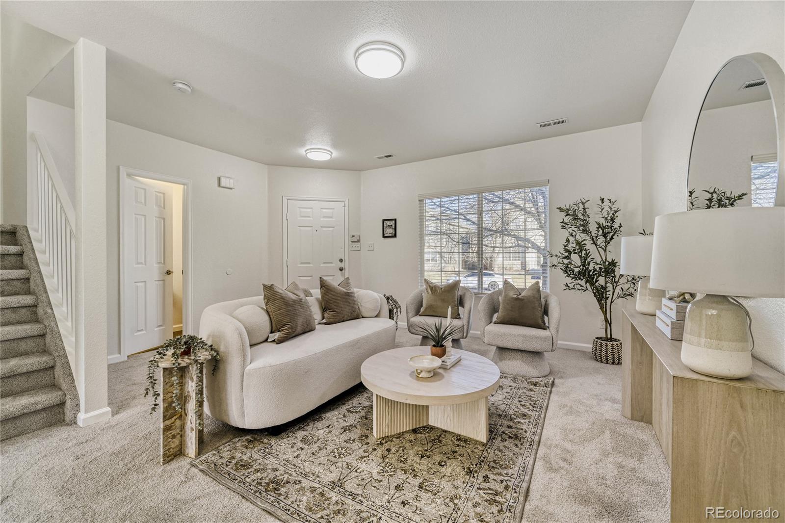 6130 Gorham Street Frederick, CO 80530 - Photo 7 of 47 a living room with furniture and a table