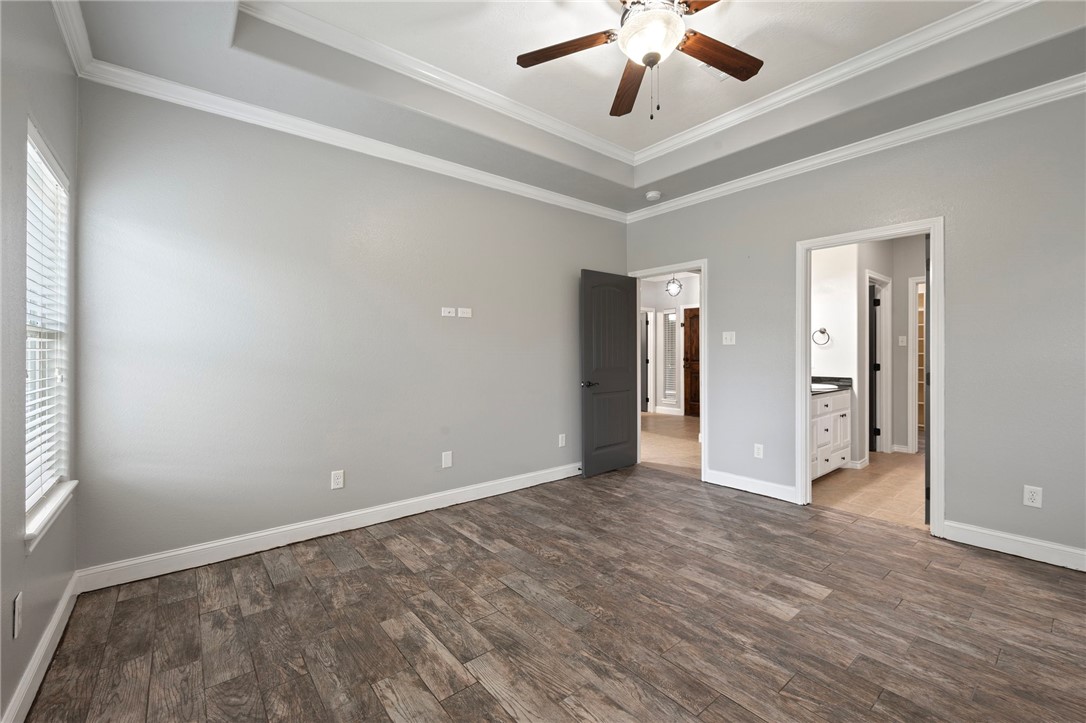 3304 Keefer Loop College Station, TX 77845 - Photo 10 of 21 an empty room with fan and entrance