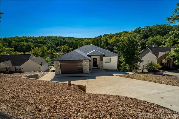 $1,399,000 | 57 Lake Road, Rocky Mount, MO 65072