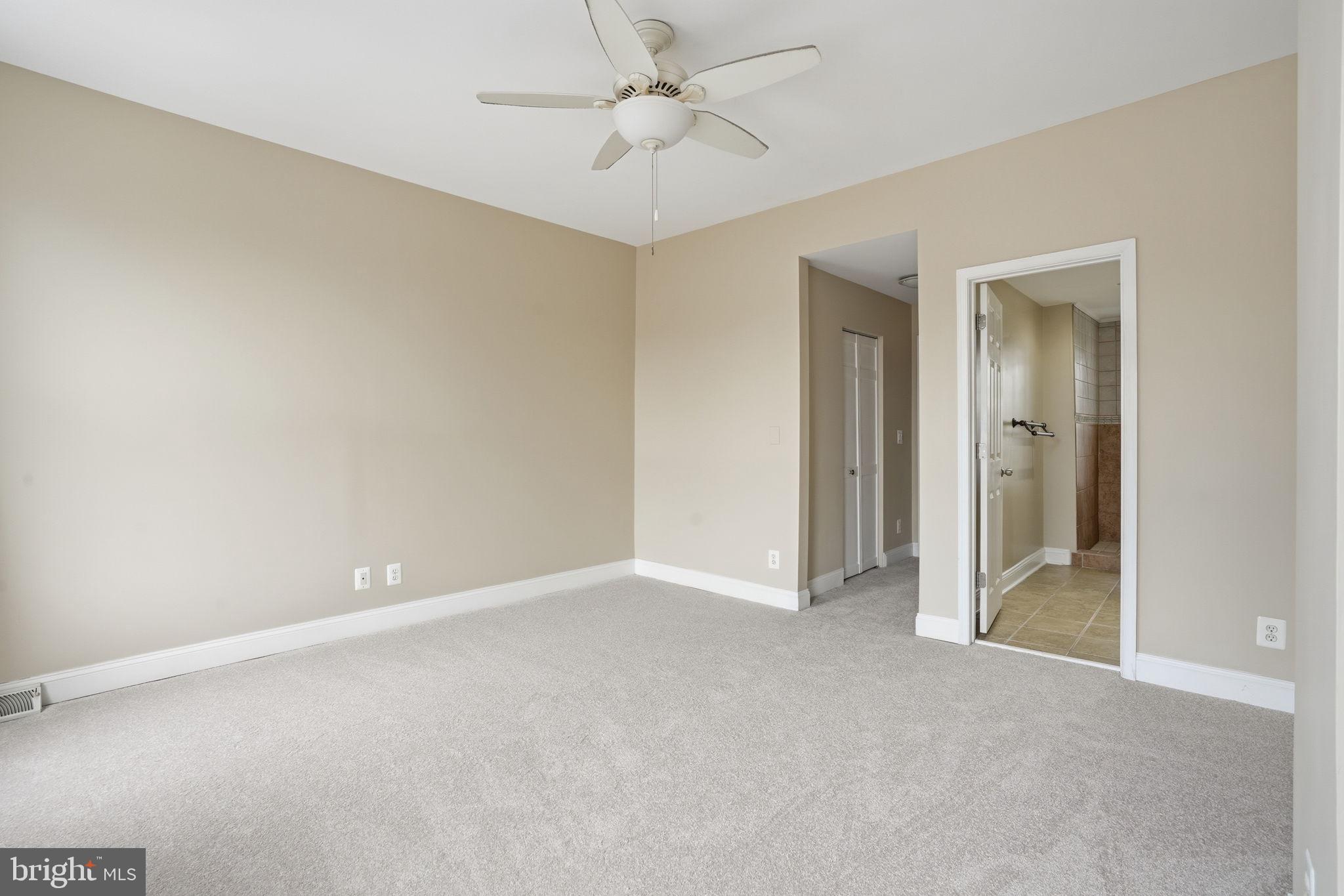 107 West Fort Avenue Baltimore, MD 21230 - Photo 25 of 34 an empty room with fan and a ceiling fan
